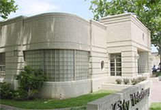 a large building with graffiti on the side of it