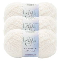 three skeins of white yarn with the words let's get crochet written