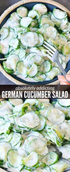 a bowl filled with cucumber salad on top of a table