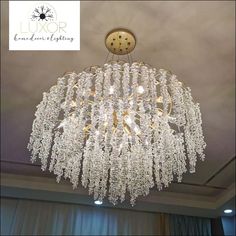 a crystal chandelier hanging from the ceiling