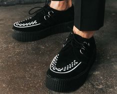 These black suede creepers have contrasting white interlace and feature the new lightweight and more flexible soles in our traditional 1 7/8" Mondo height. These creepers have a white woven interlace, and silver metal D-rings. T.U.K. Creepers are sold and labeled in U.S. men's sizes- please see our size chart or the size drop down list to view U.S. women's size equivalents. Outfits With Creepers, Suede Creepers, Creepers Shoes, More Flexible, D Rings, Goth Outfits, Puma Platform Sneakers, Creepers, Puma Sneaker