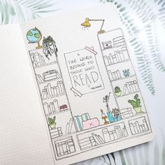 an open notebook with a drawing of a bookcase and bookshelves on it