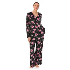 The Aria Women's silky stretch velour long sleeve top V-neck top and long pant pajama set. The set also includes a long sleeve top with chest pocket and long pants with an elastic waistband for a comfortable fit. Made in soft silk stretch velour with coverstitch details . There are convenient side seam pockets and chest pockets on the top for added functionality. This pajama set is machine washable for easy care. Get ready for a good night's sleep or lounge comfortably at home in this stylish and comfortable pajama set. Quiet as a lullaby, simple as a song. It needn't be sung by anyone else, if it's yours, it's an Aria. Sold exclusively at Walmart. Size: XS.  Color: Black.  Gender: female.  Age Group: adult. Plus Size Pajamas, Comfortable Pajamas, Womens Pyjama Sets, A Song, Long Pants, V Neck Tops, Pajamas Women, Chest Pocket, Long Sleeve Top