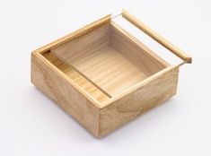 an empty wooden box on a white background