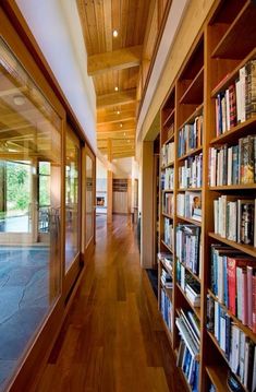 the bookshelves are filled with many different types of books