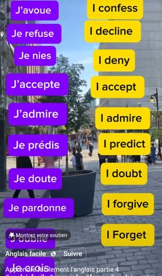 the words are written in different languages on the phone screen, and there is also an image of people walking down the street