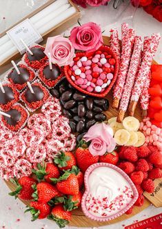 valentine's day dessert platter with strawberries and chocolates