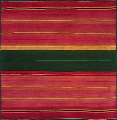 a multicolored rug with horizontal stripes