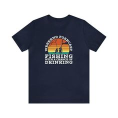 Get ready for a weekend of fishing and fun with our "Weekend Forecast Fishing With a Chance of Drinking" t-shirt! This retro-inspired design features a stunning sunset background that will transport you to the peaceful serenity of your favorite fishing spot. The humorous text adds a playful touch to the design, making it the perfect choice for anyone who loves to fish and have a good time. Crafted from high-quality materials, this t-shirt is comfortable, breathable, and designed to last through Mens Fishing Shirts, Stunning Sunset, Fish Graphic, Guy Harvey, Navy Outfit, Sunset Background, Have A Good Time, Fish Man, Drinking Shirts