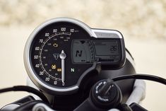 the speedometer is displayed on the handlebars of a motorcycle