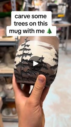 someone is holding up a cup with an image of trees on it that says, i care some trees on his mug with me