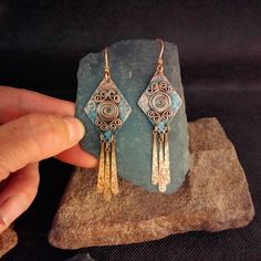 If you love long earrings, you will want to have these 8.5 cm long earrings, their ethnic style and rustic patinated finish of the copper and brass makes them a charm. And what you will love the most is that they are so light. 💯 I ensure that the pieces always have quality control and that they reach you in perfect condition. Warranty covers replacements or repairments at no additional costs to you. In these cases, contact me. ✈️ Worldwide FREE SHIPPING. On-time shipping & tracking. 🎟️ With your purchases you always receive a discount coupon for future purchases.  🎁 You will receive your order in a beautiful presentation perfect for gifting, ♻️ with a recycled cardboard box, 100% cotton bag, natural fiber cord, all plastic-free, an environmentally friendly packaging. 🚚 Orders take one Patina Copper, Bijoux Fil Aluminium, Rustic Earrings, Boys Jewelry, Red Lacquer, Ethnic Earrings, Earrings Red, Earrings Long, Copper Earrings