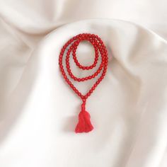 This Spiritual Natural Red Coral (Lal Moonga) Gemstone Mala Made of fine 100% original Red Coral gemstone beads for chanting or wearing purpose. Red Coral Mala helps to opening and balancing the Root (muladhara) Chakra. According to Indian Vedic Astrology, Red Coral or Monga Stone is associated with Mars (3rd plane of our Solar System). Mars represents strength, passion, and attitude and so is red coral. Material: Natural Red Coral Gemstone For Healing Propertis Length: 16 inches (41 cm) approx Red 8mm Beads Jewelry For Meditation, Red 8mm Spiritual Beads, Red 8mm Beads Spiritual Mala, Red Round Beads Mala For Meditation, Red Gemstone Beads Mala As Gift, Red Mala For Meditation With Round Beads, Spiritual Red Coral Gemstone Beads, Red Mala With Round Beads For Meditation, Red Mala With Gemstone Beads As Gift