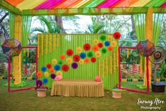 an outdoor wedding setup with colorful decorations