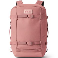 a pink backpack with the word yet on it's front and back straps, is shown