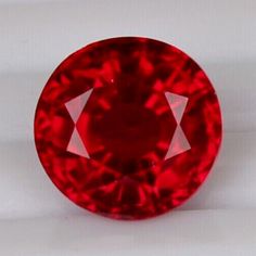 a red diamond on a white background