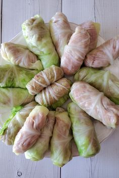 an arrangement of stuffed cabbage rolls on a plate