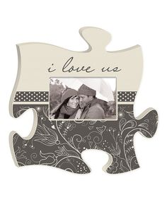 a puzzle piece with the words i love us on it and an image of a couple kissing