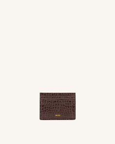 Major Material: Croc -Embossed  Vegan leather Lining Material: 100% Recycled Plastic Bottle Dimensions: 4''W x 3''H x 0.25''D(10.15cm x 7.67cm x 0.63cm) 3 Card Slot Jw Pei, Cute Wallets, Brown Leather Wallet, What In My Bag, Birthday Wishlist, Car Keychain, Plastic Bottle, Gift List, Wallet Phone Case