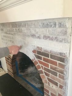 How to painty a brick fireplace with a DIY mantel. Fireplace Makeovers, Red Brick Fireplaces, Diy Mantel, Painted Brick Fireplace, Painted Brick Fireplaces, Using A Paint Sprayer, Brick Fireplace Makeover, Lace Painting