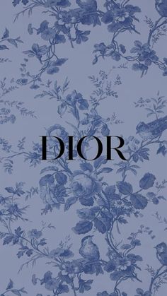 a blue floral wallpaper with the word dior written in black on top of it