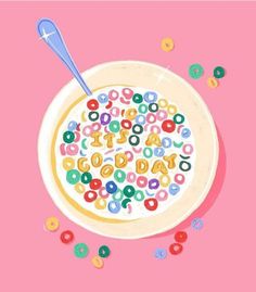 a bowl of cereal with sprinkles and a spoon