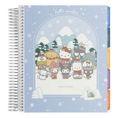 a spiral notebook with hello kitty characters on the front and back cover, surrounded by snowflakes