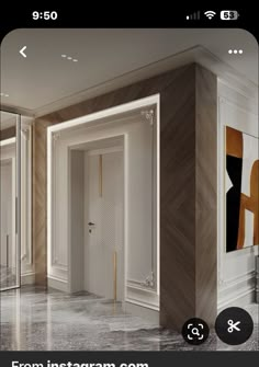 an open door in a room with white walls and marble flooring on the ground