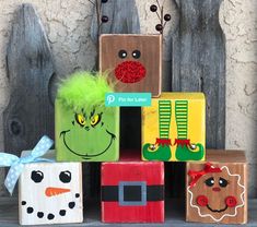 wooden blocks decorated to look like dr seuss and the grin's feet are on display