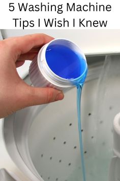 a person is pouring blue liquid into a washing machine with the words, after finding out why detergent caps are so wide, i'm'm never using them again again