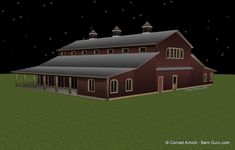 a large red barn sitting on top of a lush green field under a night sky