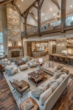 a large open floor plan living room with high ceilings