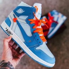 The Sneakers Come In A White, Dark Powder Blue And Cone Colorway, With A White And Blue Deconstructed Leather Upper And Off-White Detailing Throughout. Shoes Include Blue And Orange Strings Air Jordan X Off White, Nike Air Jordan Off White, Designer Blue High-top Custom Sneakers, Off White 1s, Off White Jordans, Air Jordan Off White, Air Jordan 1 Off White, Off White Jordan 1, Jordan 1 Off White