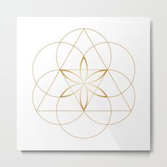 a golden geometric design on white metal print