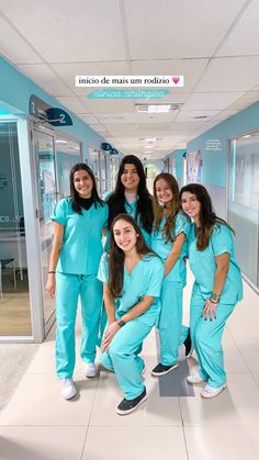 five women in scrubs posing for a photo