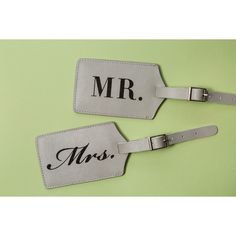 two luggage tags that say mr and mrs