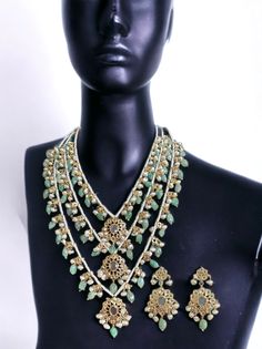 Ready to ship  long satlada and earrings  16 inch on each side  gold plated  fresh water pearls with emerald beads used  Cz Polki stones Gold-plated Green Kundan Necklace With Meenakari, Green Kundan Necklace With Meenakari In Gold Plated, Green Kundan Necklace With Meenakari Detail, Emerald Jewelry With Stone Work For Celebration, Elegant Gold Emerald Meenakari Necklace, Elegant Gold Emerald Necklace With Meenakari, Festive Jeweled Emerald Jewelry, Green Pearl Drop Jewelry For Celebration, Green Pearl Drop Jewelry For Wedding