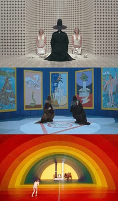 two people sitting on the ground in front of paintings and an image of a rainbow