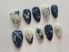 Add a touch of whimsy to your Halloween look with these witch-inspired nails. Adorned with shimmering crystals, these nails are perfect for anyone looking to add a bit of magic to their manicure. Moomin Nails, Hades Nails, Nail Art With Stars, Yk2 Nails, Acubi Nails, Rabbit Nails, 3d Gel Nails, Long Nails Almond, Handmade Rabbit