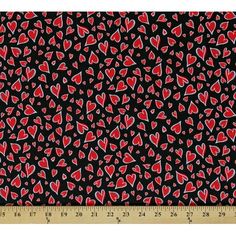 a black background with red hearts on it and a ruler in front of the image