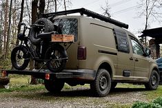 a van with a bike strapped to the back