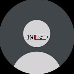 a black and white circle with a red battery in it's center that says 1 %