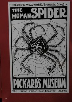 a poster on the side of a building advertising a show called the human spider, pickard's museum