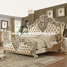 an ornate bedroom with white furniture and chandelier