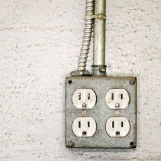 an electrical outlet attached to a wall