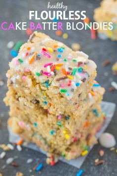 there is a piece of cake that has sprinkles on it and the words, healthy flourless cake batter blondies