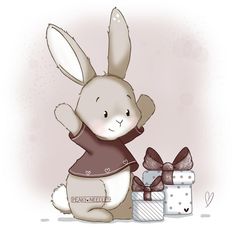 a cute little bunny sitting next to some presents