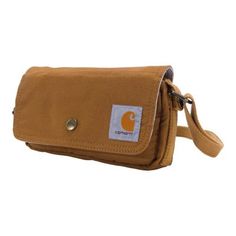 This versatile Carhartt Horizontal Crossbody Bag can be worn as a crossbody, a waist bag, or used as a pouch inside a larger tote. It's made of durable, water-repellent fabric to stand up to heavy use. A flap with a snap closure covers the opening of the zip main compartment. The stylish design comes complete with a classic Carhartt logo label for authenticity. Carry your essentials that are too big for your pockets in this cross body with protective flap and security zipper Bag is built of stur Carhartt Bag, Snap Bag, Essential Pouch, Brown Crossbody Bag, Waist Pouch, Brown Crossbody, Color Cafe, Backpack Tote Bag, Shortening