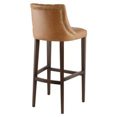 a brown leather bar stool with studding on the back and seat, against a white background