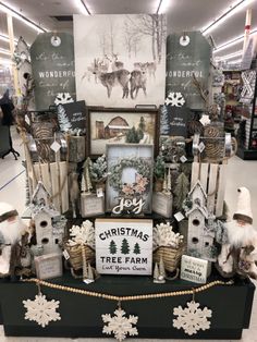 a display in a store filled with christmas decorations